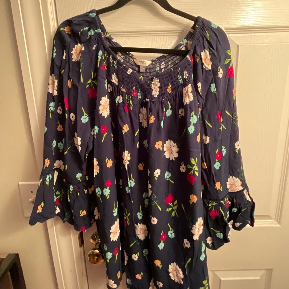 Blue blouse with flowers and bell sleeves